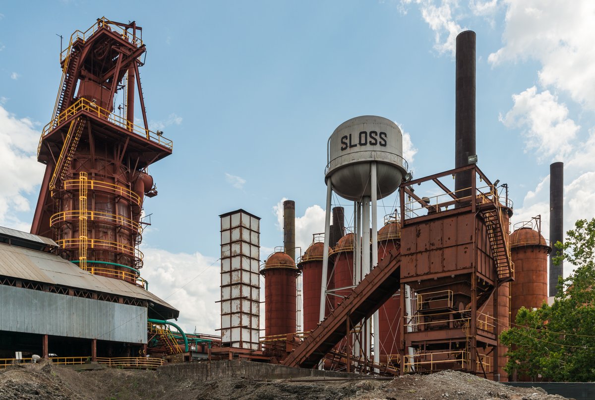 Sloss Furnaces in Birmingham, furnace tower, stoves, and the water tower lettered SLOSS