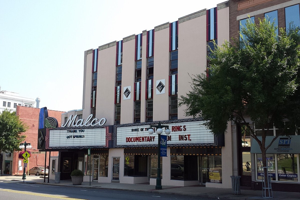 Malco Theatre in Hot Springs, script sign and doors under the marquee