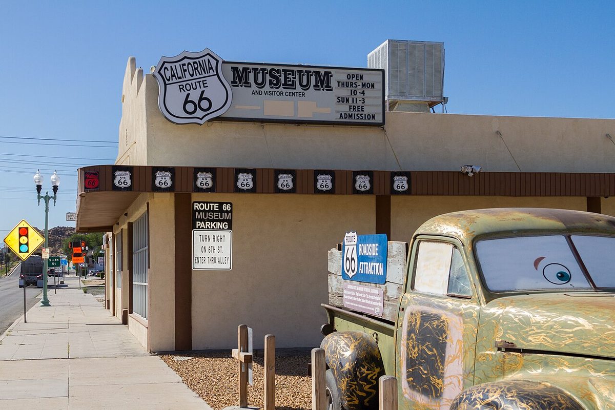 Exterior of the California Route 66 Museum on D Street in Victorville with a vintage truck out front