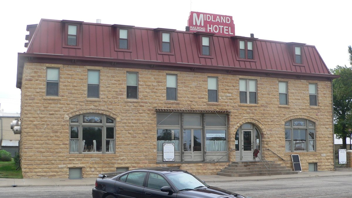 Midland Railroad Hotel in Wilson, stone front and roof sign