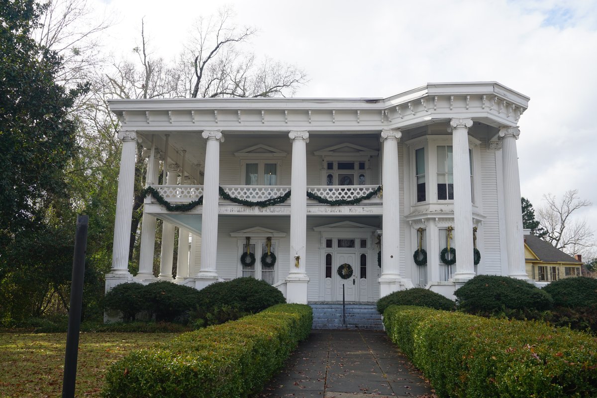 Merrehope in Meridian, white house, columns, and double doors