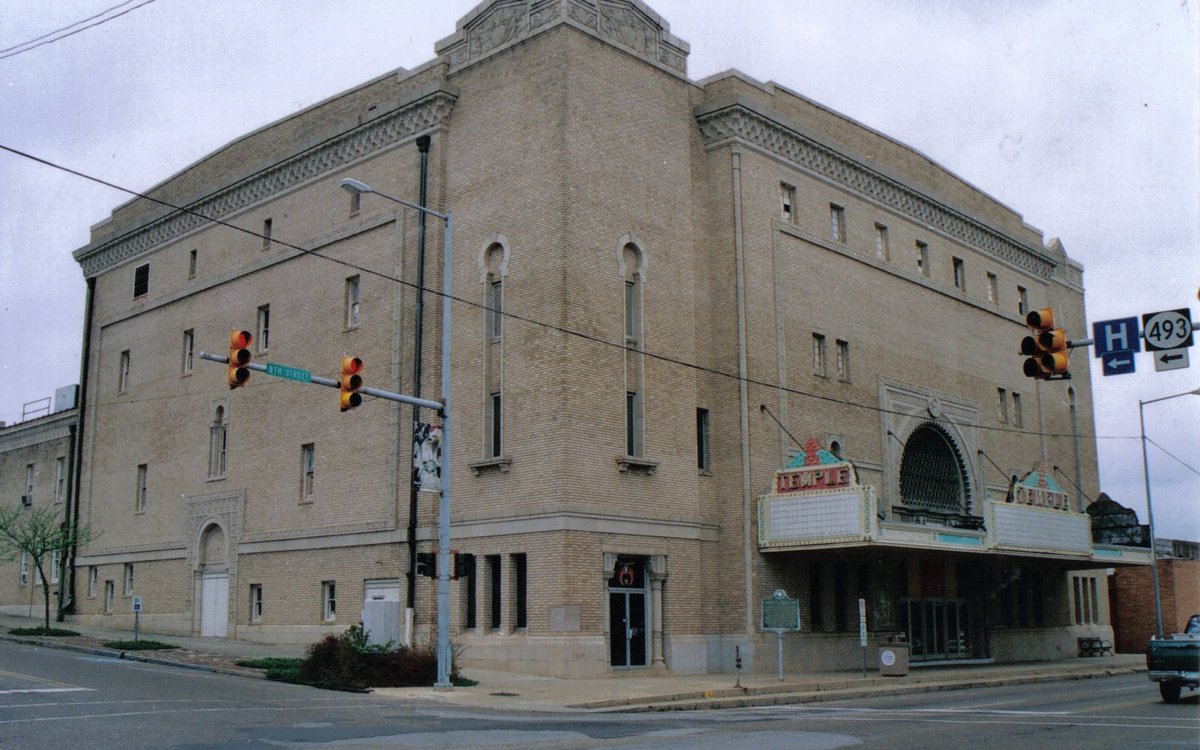 Temple Theatre in Meridian, brick corner, marquee, and doors under the marquee