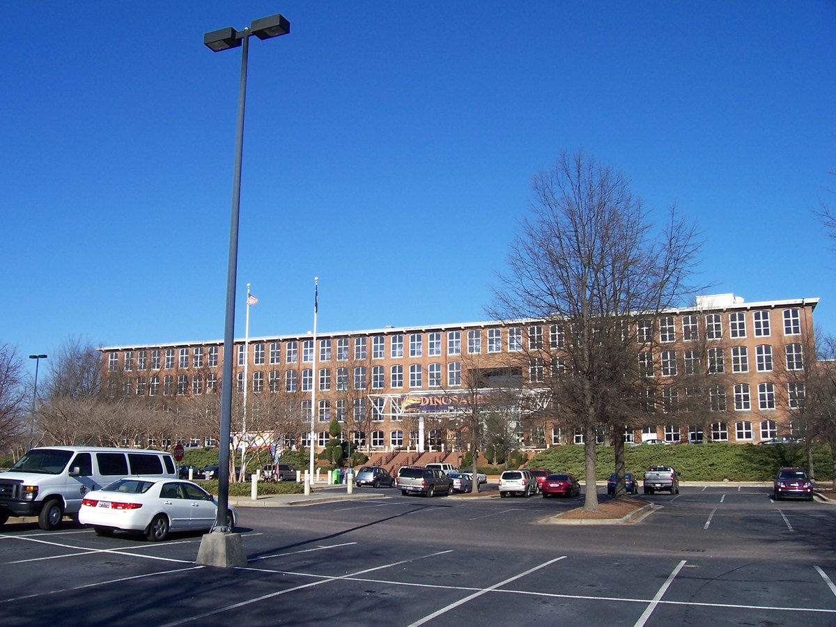 South Carolina State Museum in Columbia, the long brick mill, the rows of windows, and the entrance across the lot